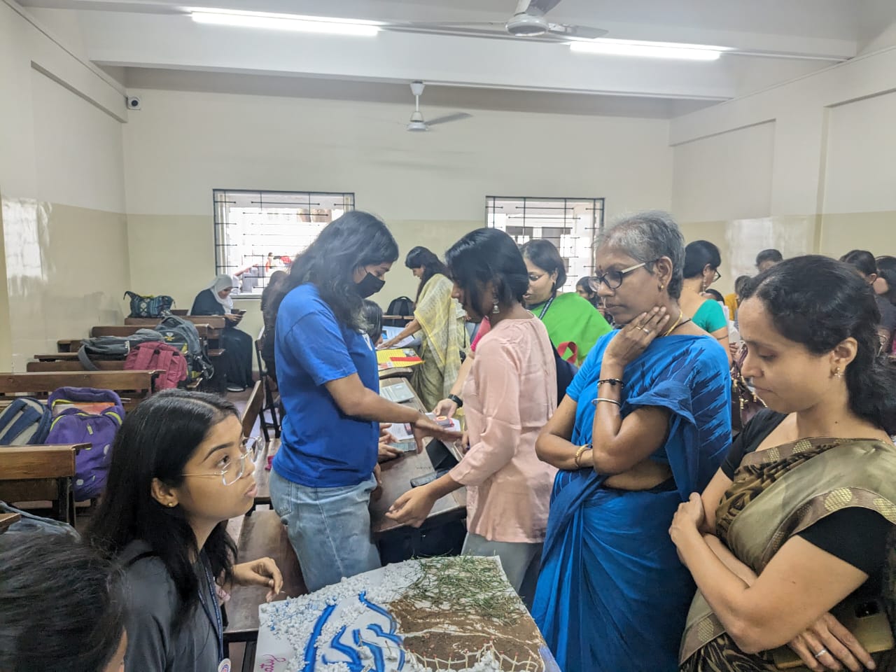 Teachers engaging with students during the exhibition- Exhibition- Water Politics- Dept of Politics and Public Administration 2023-24